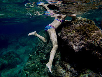 Full length of girl swimming in sea