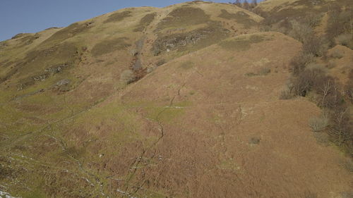 Scenic view of land against sky