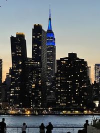 Illuminated buildings in city at night