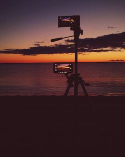 Scenic view of sea at sunset