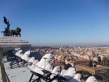 View of cityscape against clear sky