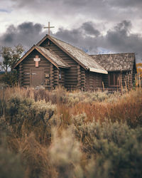 House on field against sky