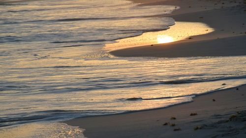 Scenic view of beach during sunset