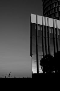 Silhouette of building at sunset