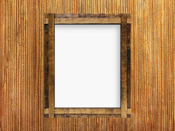 Close-up of empty picture frame on table