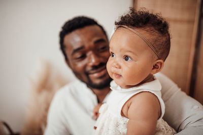 Portrait of mother with baby