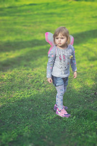 Cute girl on field