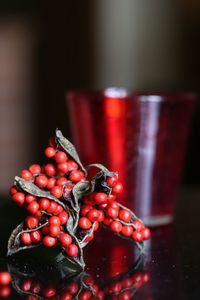 Close-up of cherries on table