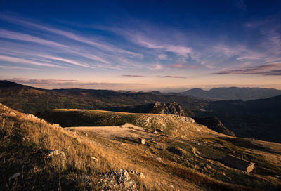 Scenic view of landscape against sky during sunset