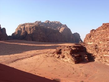 Scenic view of rock formations against sky