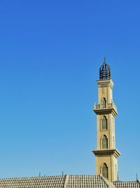 A minaret of a mosque in the springs, dubai united arab emirates, july 2021.