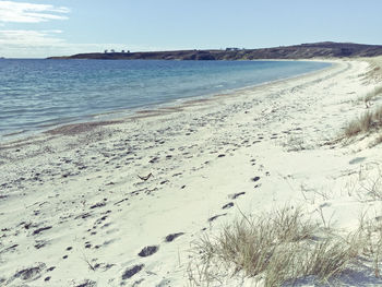 Scenic view of beach against sky