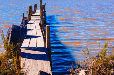 Scenic view of jetty on lake