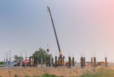 Construction site background. hoisting cranes and concrete truck new.building construction site
