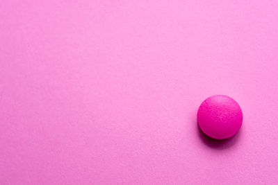 High angle view of heart shape on pink ball