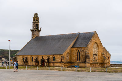 Exterior of historic building against sky