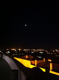 Illuminated street light at night