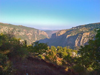 Scenic view of mountains against clear sky