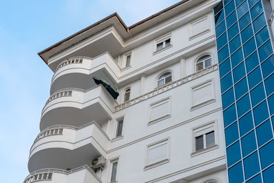 Modern ventilated facade with balconies. estate.