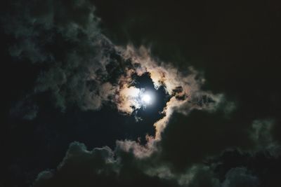 Low angle view of moon in sky at night
