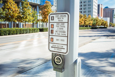 Information sign on road in city