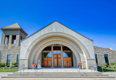 Facade of building against blue sky