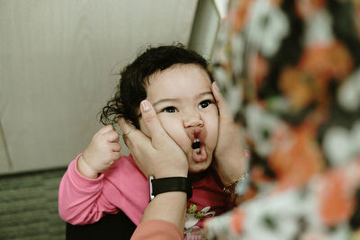 Portrait of cute girl at home