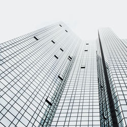 Low angle view of skyscraper against clear sky