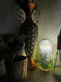 Close-up of illuminated lighting equipment on table at home