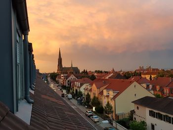 High angle view of buildings against sky during sunset