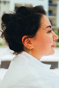 Close-up of young woman looking away