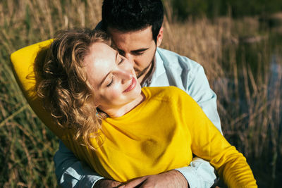 Close-up of young couple outdoors