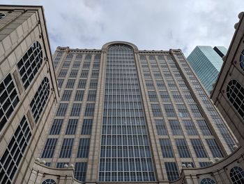 Low angle view of modern buildings against sky