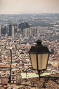 High angle view of buildings in city against sky