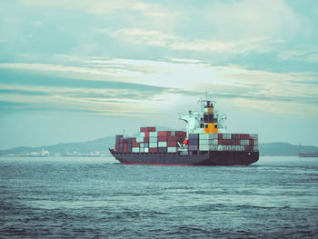 View of ship in sea against sky