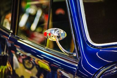 Close-up of blue vintage car