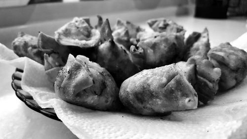 Close-up of served meat in plate on table