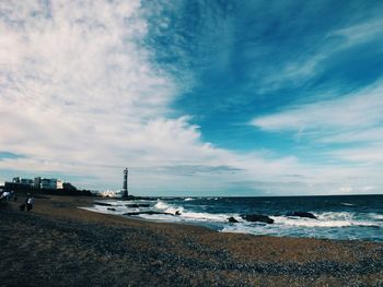 Scenic view of beach against sky