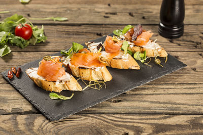 Close-up of served fish on table