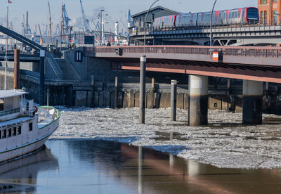 Ships and barges frozen by ice in the port of hamburg