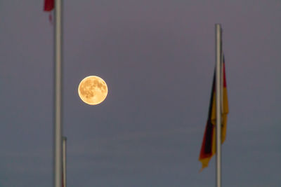 Low angle view of flag against sky