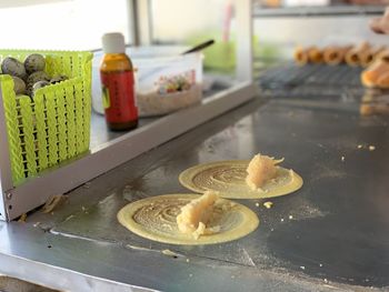 Close-up of fruits served on table at store