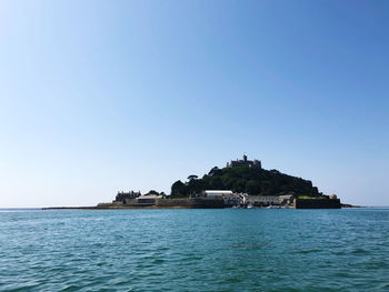 Scenic view of sea against clear sky