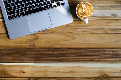 Directly above shot of coffee cup on table