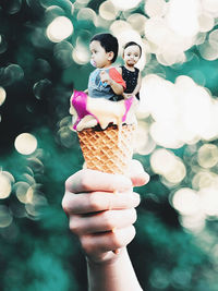 Man holding ice cream cone