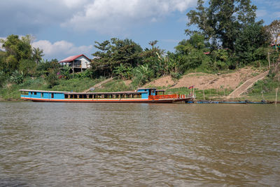 Wooden boats at the mekong river of luang prabang in laos southeast asia