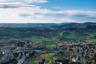 Aerial view of townscape against sky