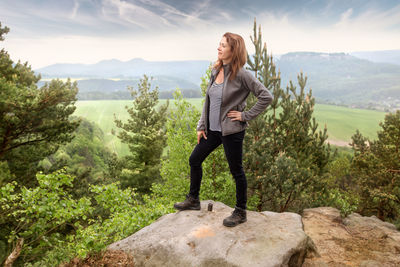 Full length of man standing on mountain