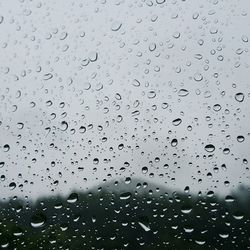 Close-up of water drops on glass