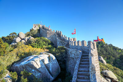 View of fort against clear blue sky